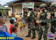 Satgas Yonif 126/KC Salurkan Bantuan dan Layanan Kesehatan di Tembutka