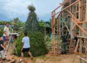 Pos Segumun Satgas Pamtas RI-Malaysia Yonarmed 16/TK melaksanakan kegiatan Karya Bhakti di Gereja