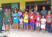 Wujud Toleransi Beragama, Satgas Yonarmed 10/Bradjamusti Bagikan Bantuan Alkitab Dari Pangkostrad