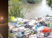 Mobil Truk Dinas Lingkungan Hidup Diduga Buang Sampah ke Tepian Sungai Kisau