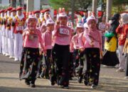 Ratusan Pelajar di OKI Ramaikan Lomba Gerak Jalan dengan Kostum Unik