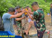 Peduli Lingkungan, Satgas Yonif 131/BRS Perkuat Sinergi dengan Masyarakat melalui Karya Bakti Bersihkan Saluran Air