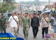 Kirab Senja Drum Band Dharma Loka Yang Digelar Dalam Rangka Tradisi Perpisahan Danyonif 330 Kostrad ke 41 Dengan Warga Cicalengka