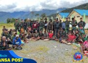 Pererat Tali Silaturahmi, Satgas Yonif 715/Mtl Ajak Masyarakat Puncak Jaya Makan Bersama
