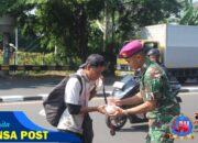 Prajurit Batalyon Kapa 1 Marinir Berbagi Makanan dengan Warga Sekitar