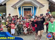 Satgas Yonif 131/Brajasakti Berbagi Makan Bergizi Sehat di Kampung Skofrow Perbatasan Papua