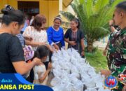 Berbagi Kasih di Hari Minggu, Satgas Yonif 131/Brajasakti Hangatkan Hati Warga Papua