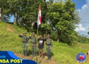 Nuansa Kemerdekaan Mulai Terasa di Tembutka, Satgas Yonif 126/KC dan Warga Bersatu Kibarkan Semangat Merah Putih