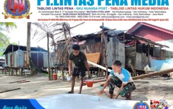Satgas TMMD Kodim 1710/Mimika Lakukan Pengecatan Triplek Demi Hasil Maksimal